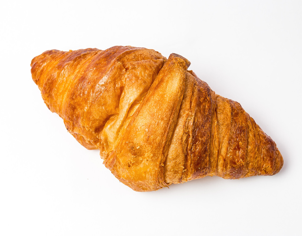 delicious croissant white background