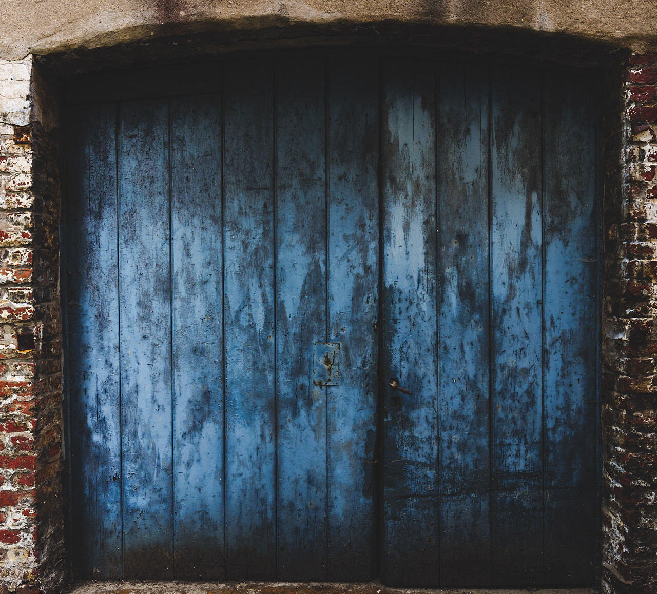 old weathered blue gate