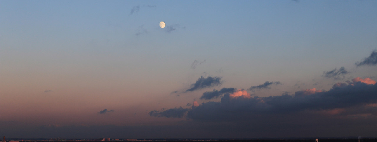 day moon over munich