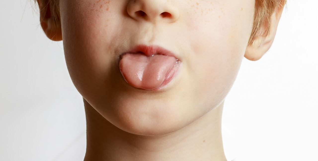 Child shows the tongue