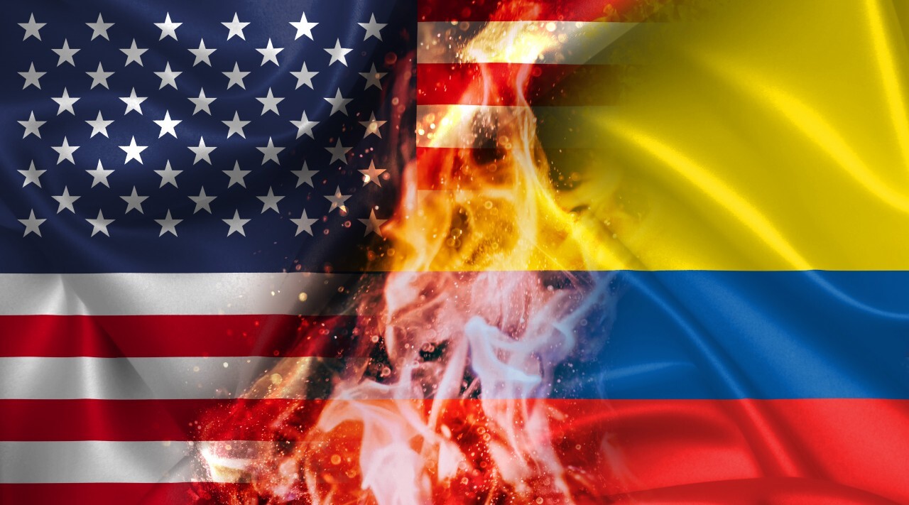 USA vs Colombia burning Flag - conflict war comparison on fire illustration