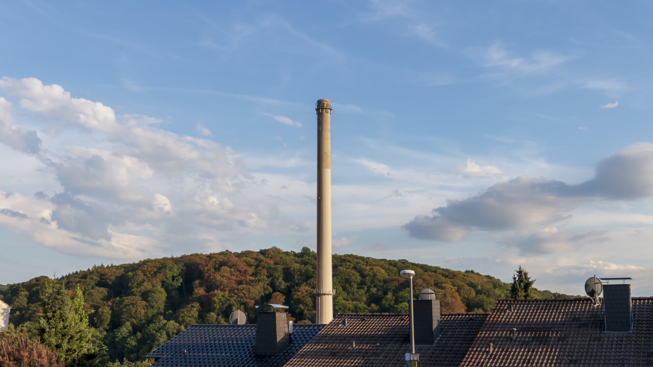 industrial chimney over roofs