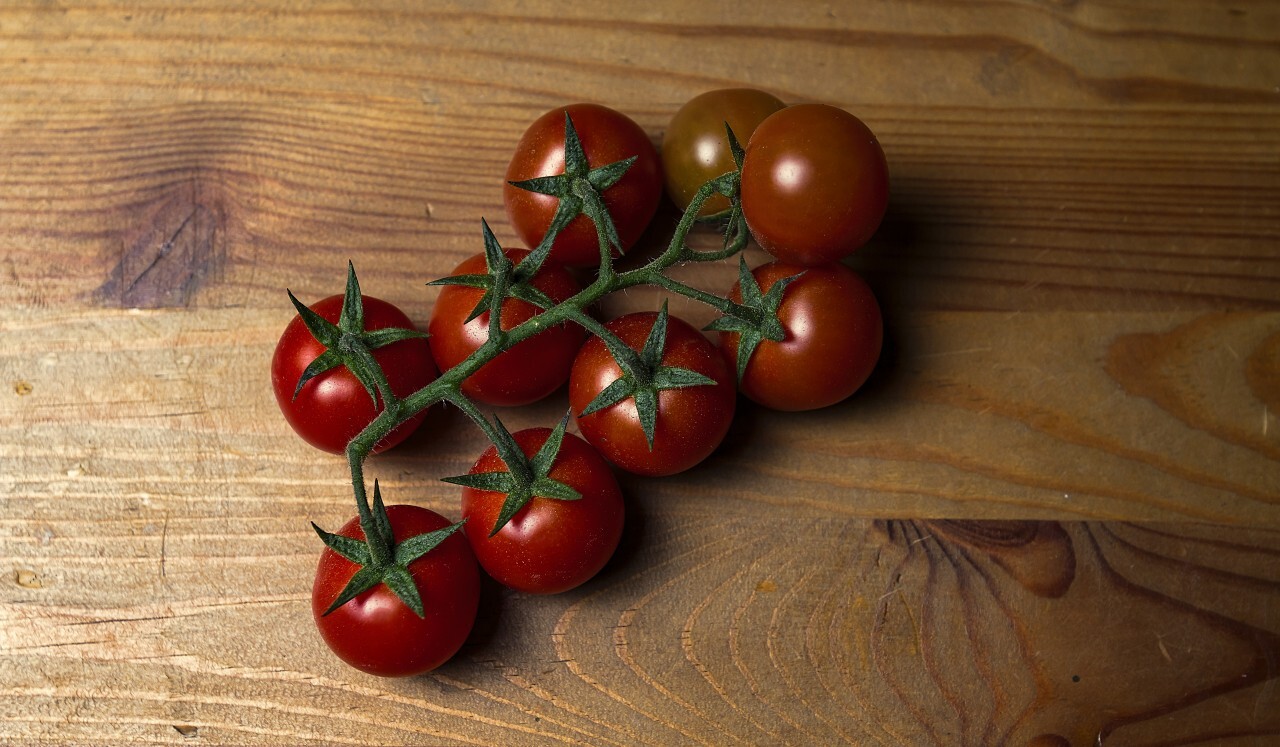 tomatoes on a wooden board