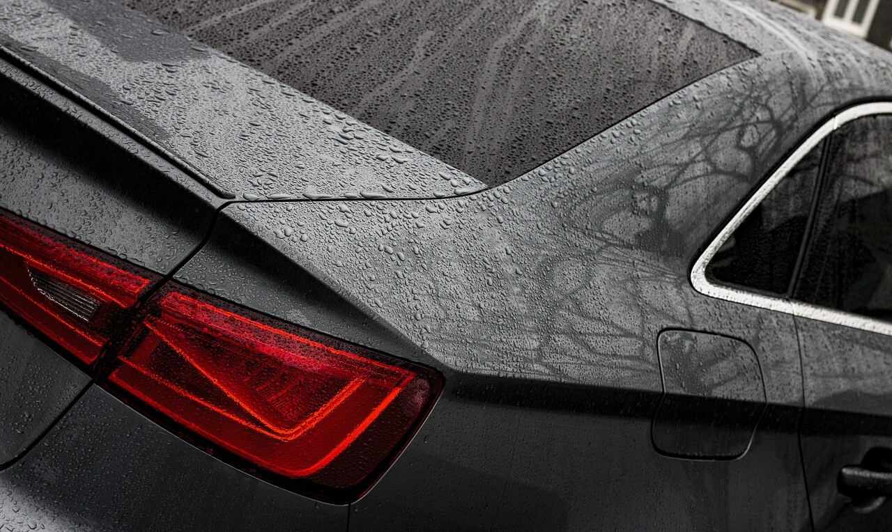 wet gray car in rain