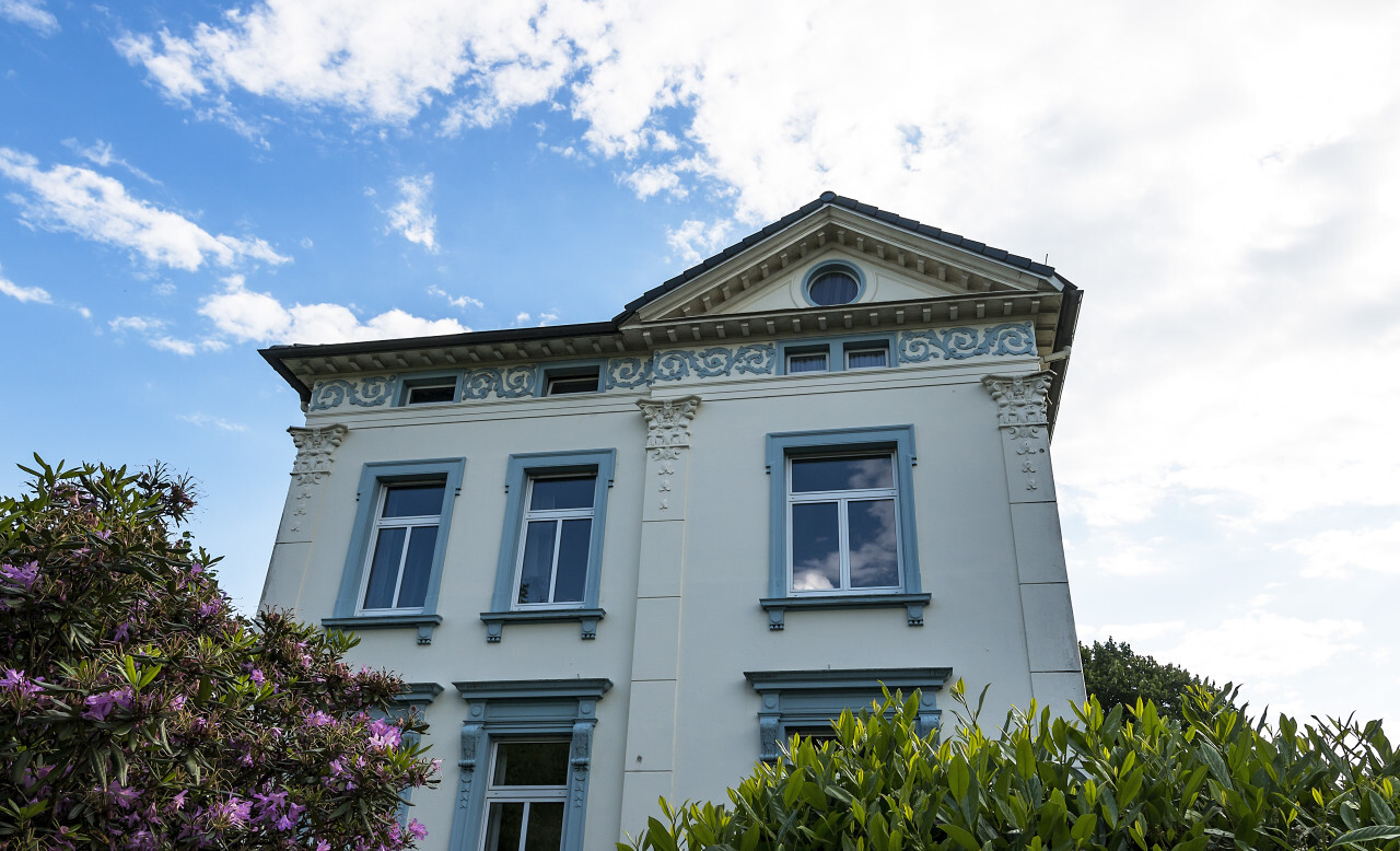 old beautiful blue white house