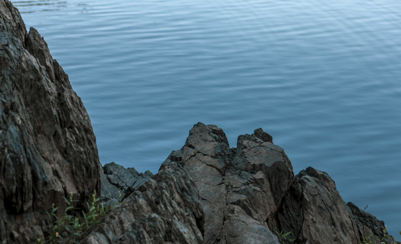 rock in blue water