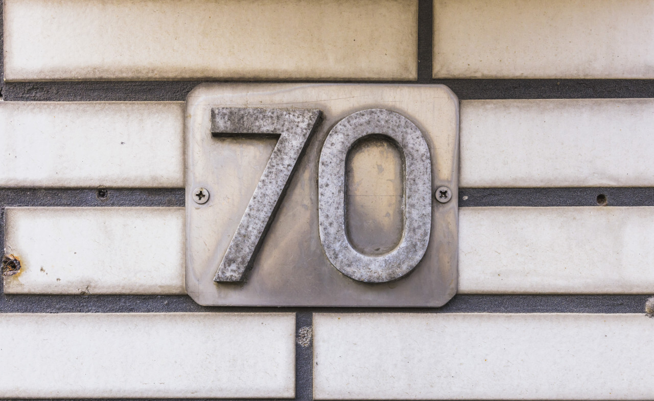 Number 70 (seventy) on a house wall