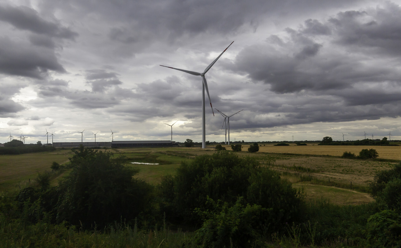 wind turbines between fields in germany