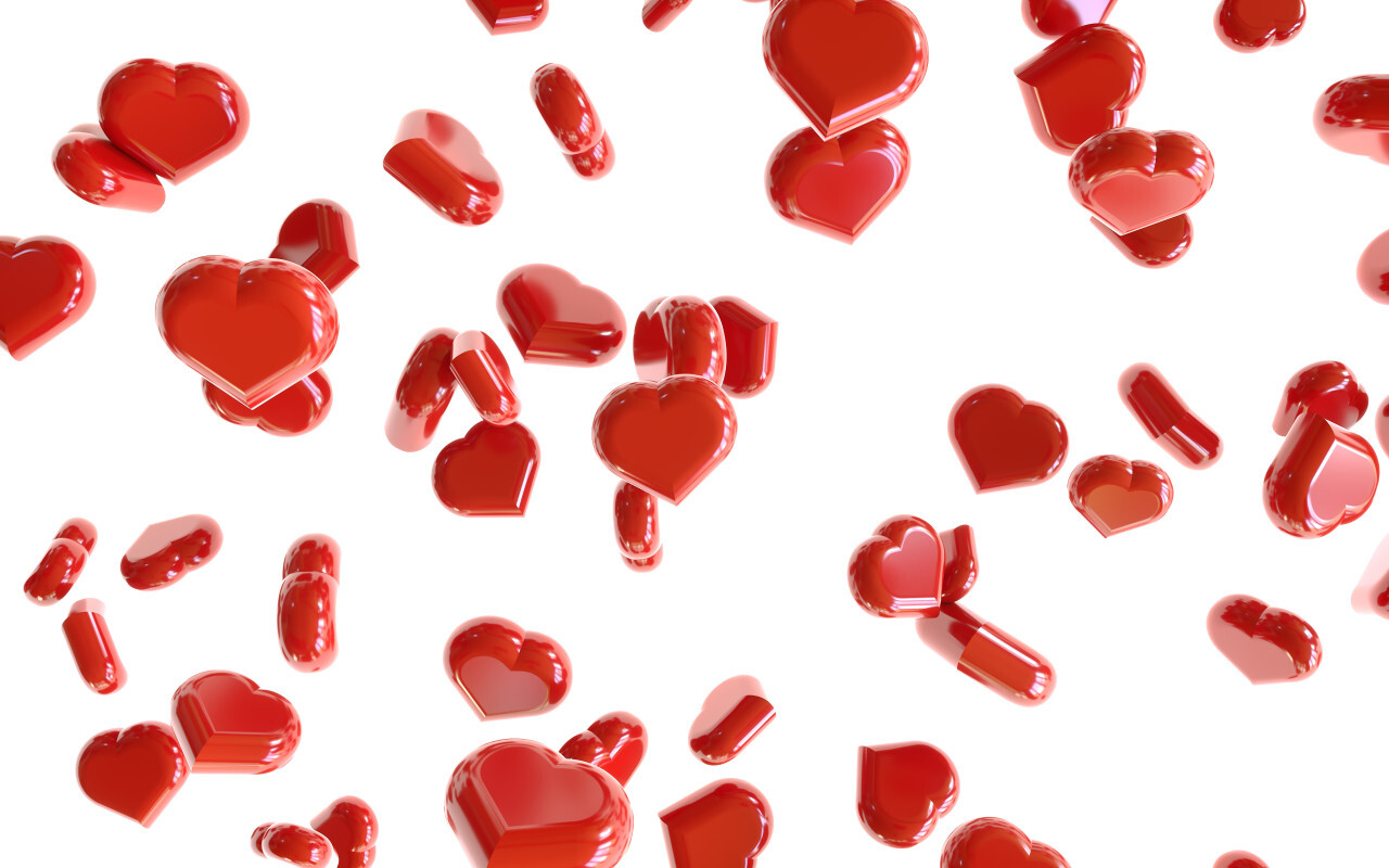 Heap of red hearts on white background falling down