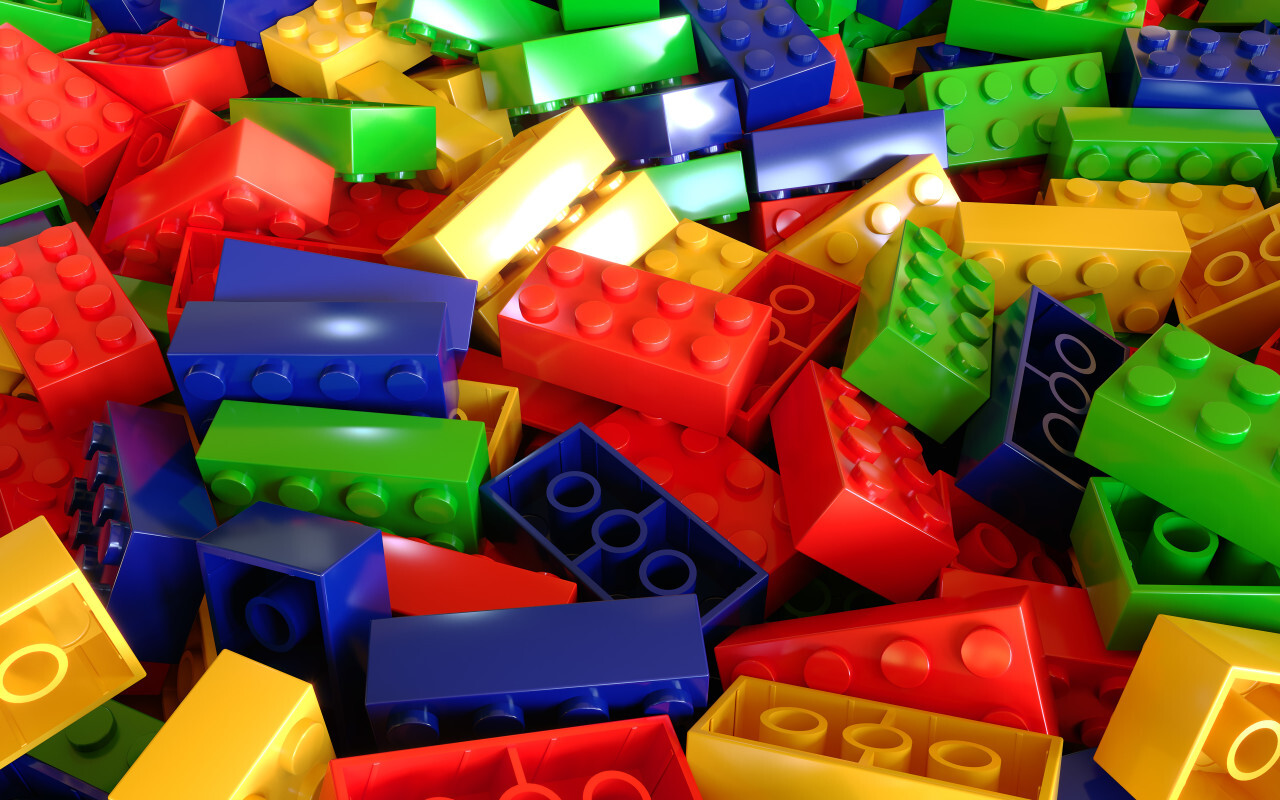 Heap of color plastic toy bricks