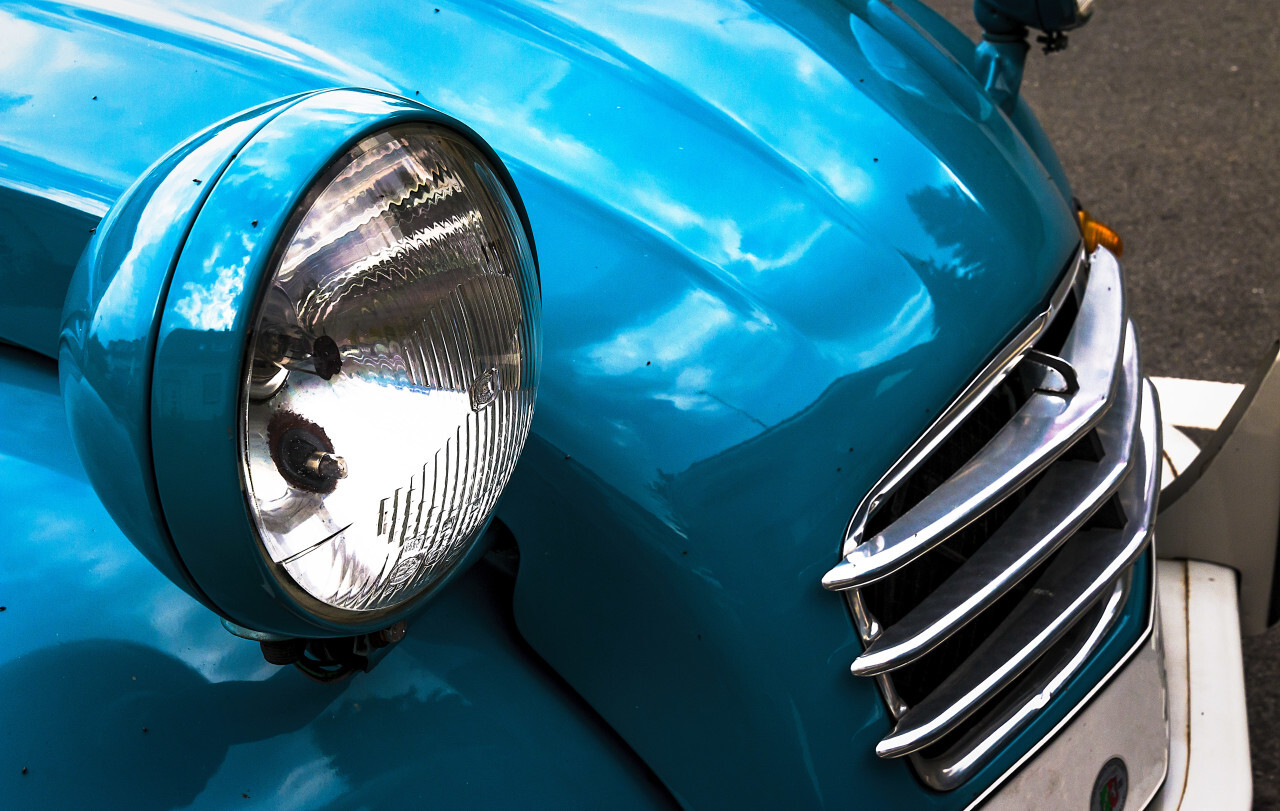 blue classic car headlights
