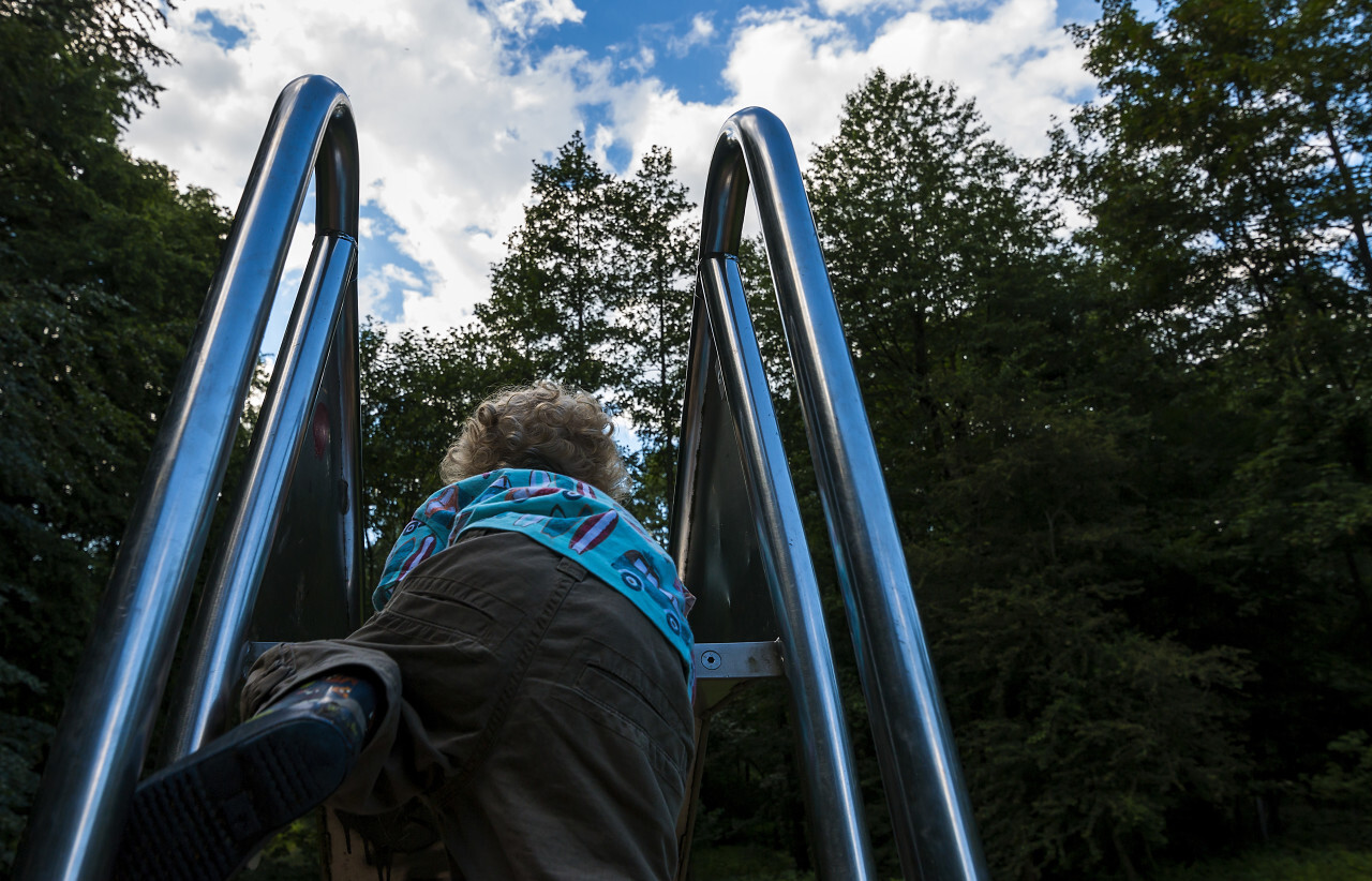 Child on playground slide