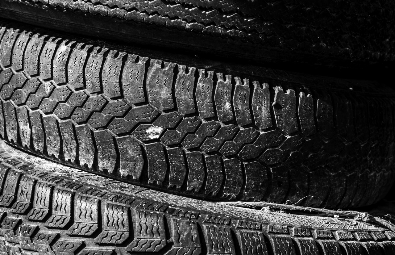 stack of old used car tires