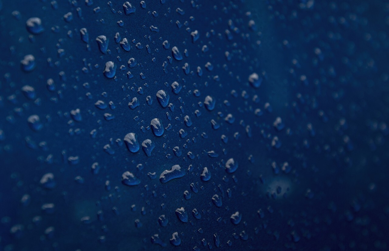 raindrops on blue carpaint