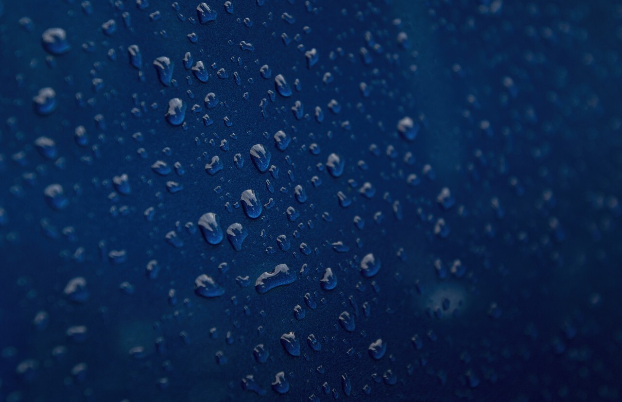 raindrops on blue carpaint