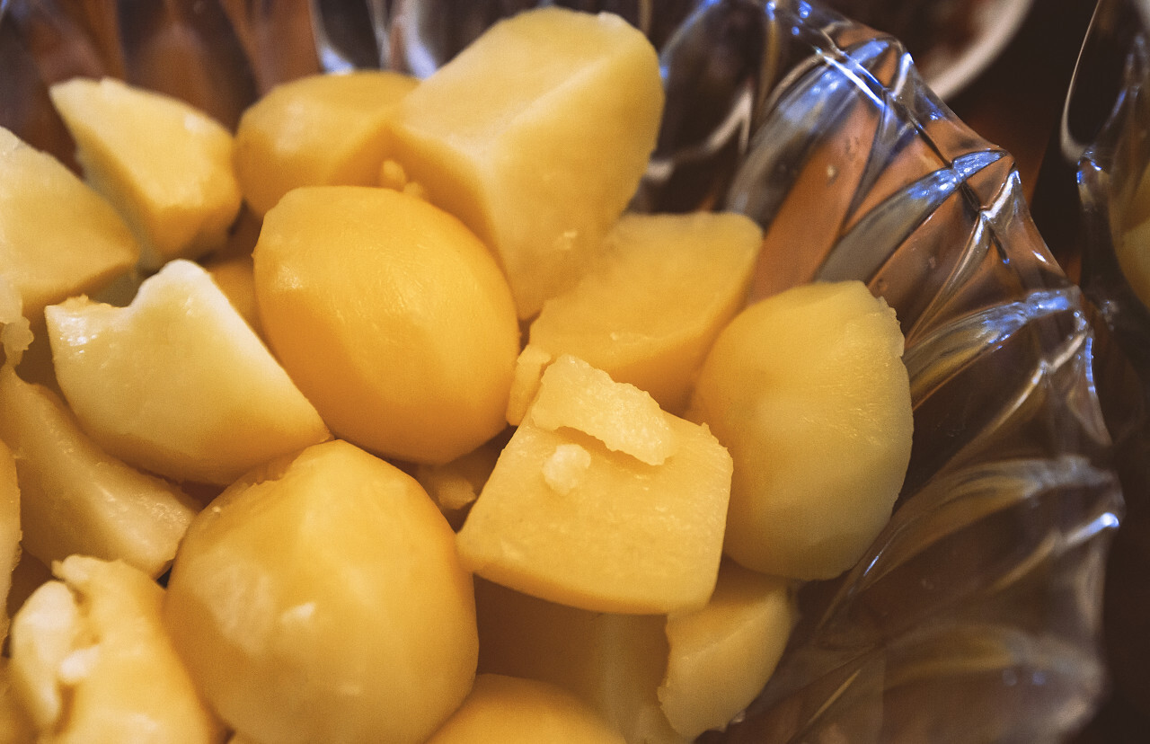 boiled potatoes in glass bowl