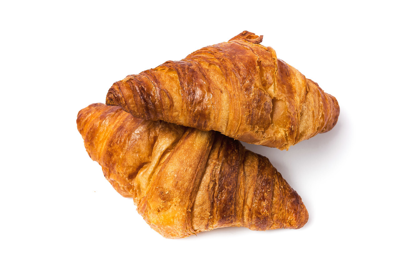 two croissants isolated on white background