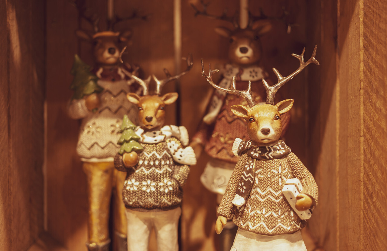 christmas decoration reindeers on wooden background