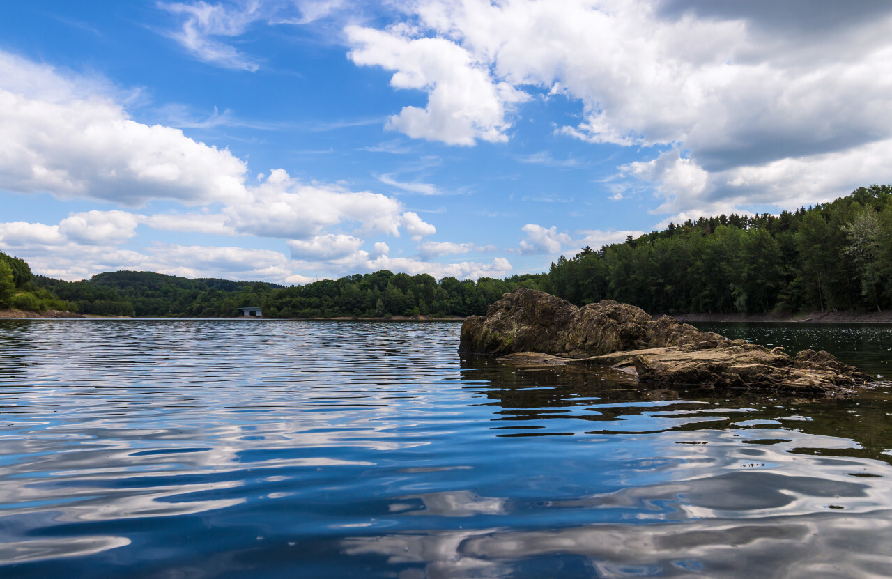 rock in lake landscape