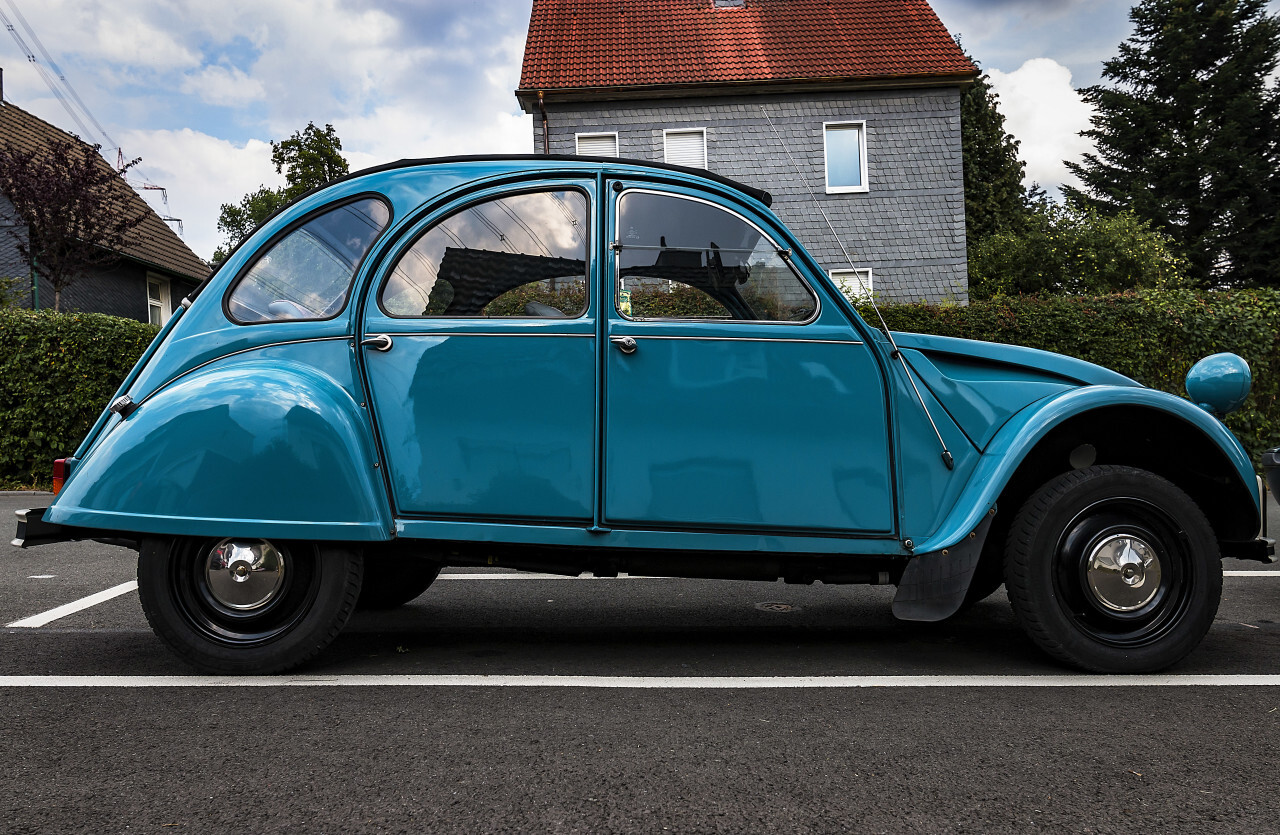 blue classic car from the side