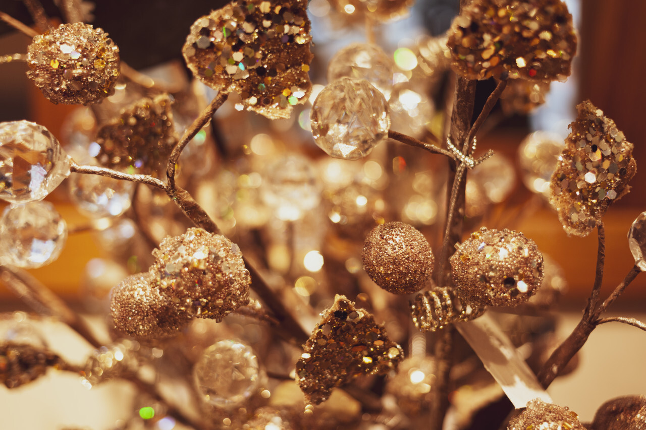 golden christmas tree decoration on a beautiful bokeh background