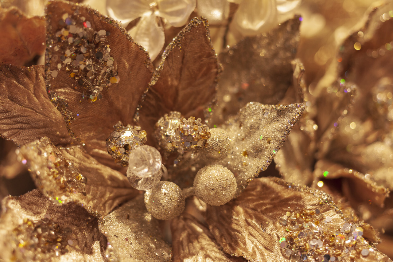 golden christmas tree decoration on a beautiful bokeh background