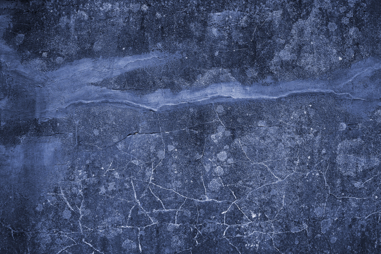 decorative blue grunge concrete texture with cracks background