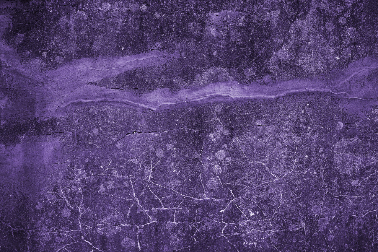 decorative purple grunge concrete texture with cracks background