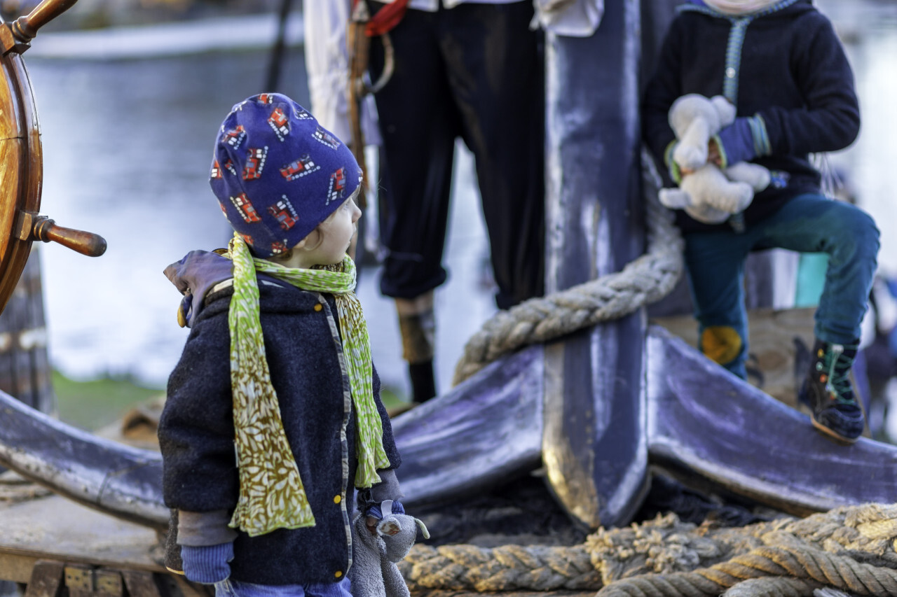 A toddler experiences an adventure on a pirate ship