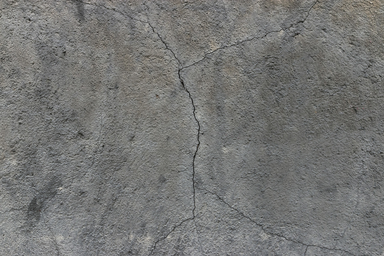 gray wall with cracks texture