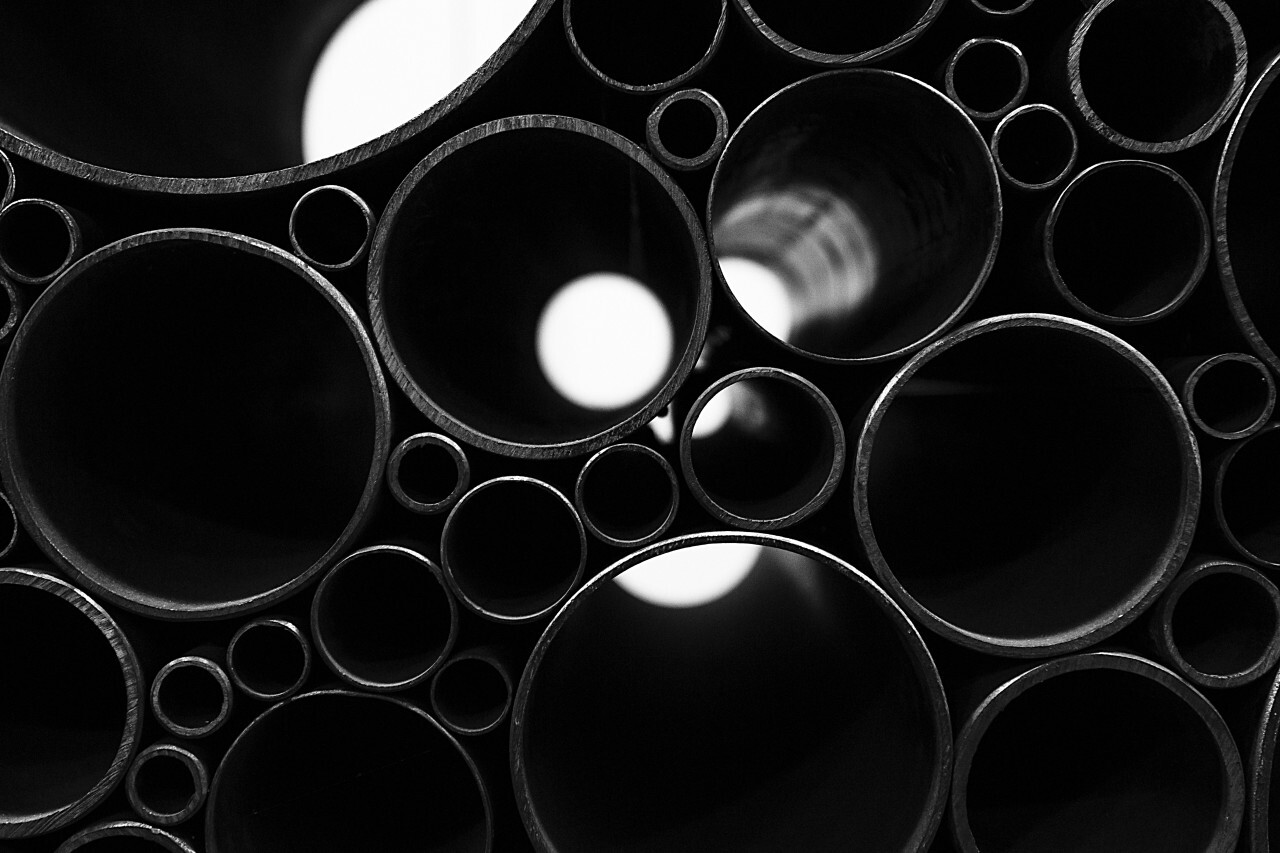 industrial abstract metallic pipe background black and white