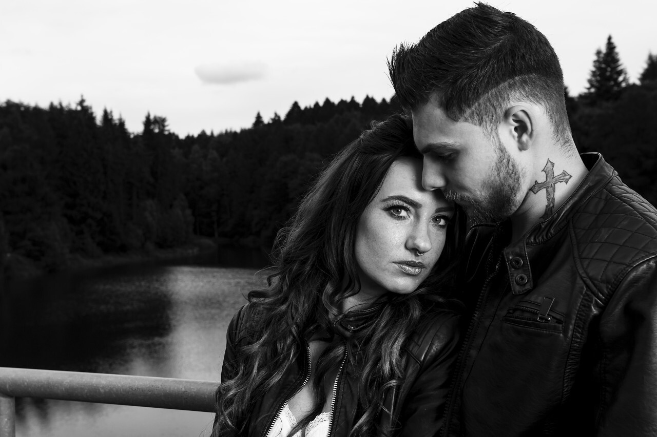 couple at a lake in black and white