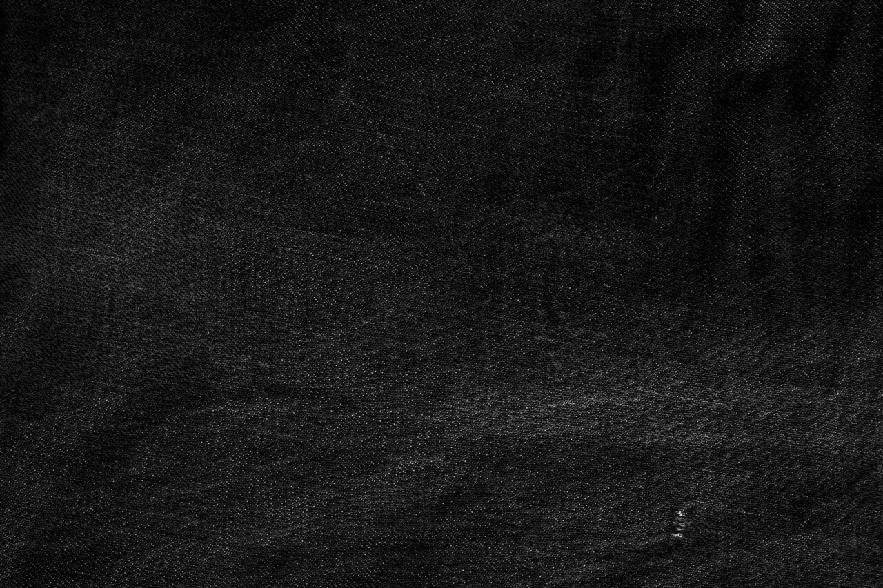 Black denim jeans cloth texture background