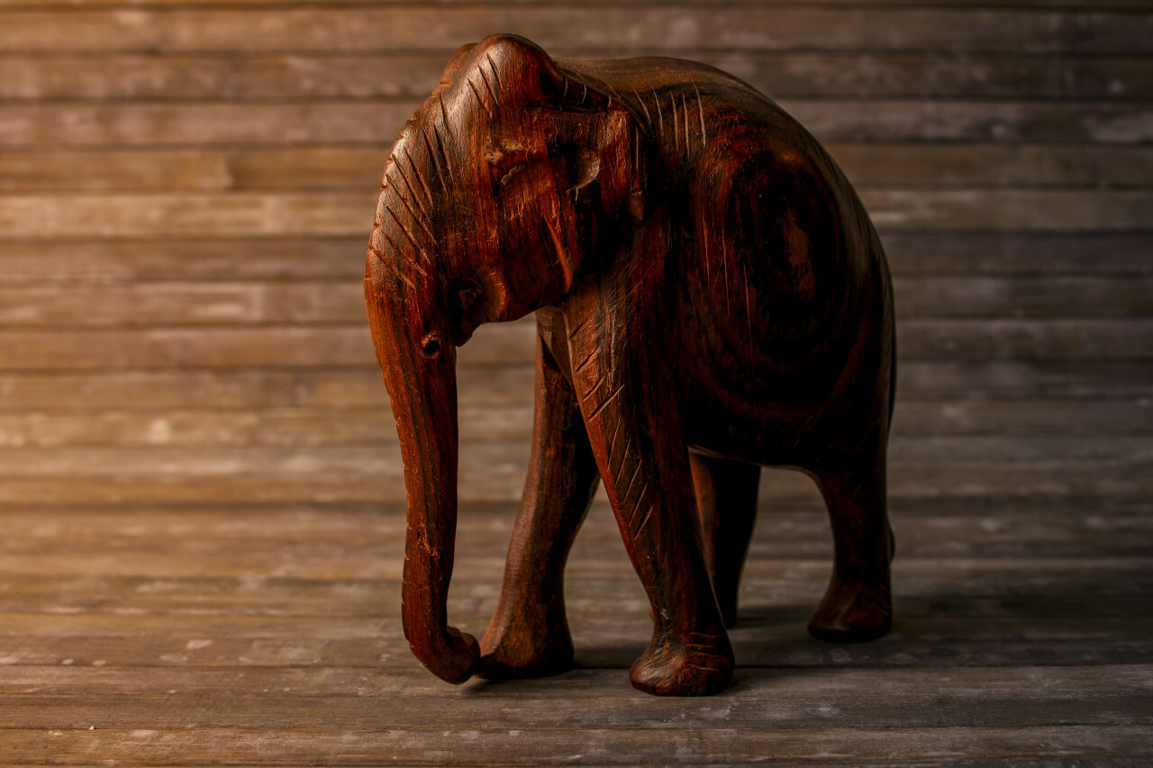 Carved wood elephant figure