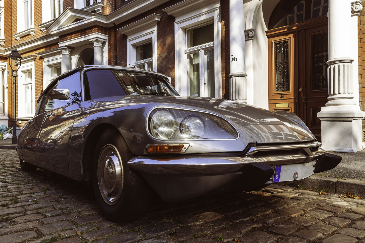 Lübeck, Schleswig-Holstein, Germany - JULY 28, 2019: beautiful old classic car in the medieval old town