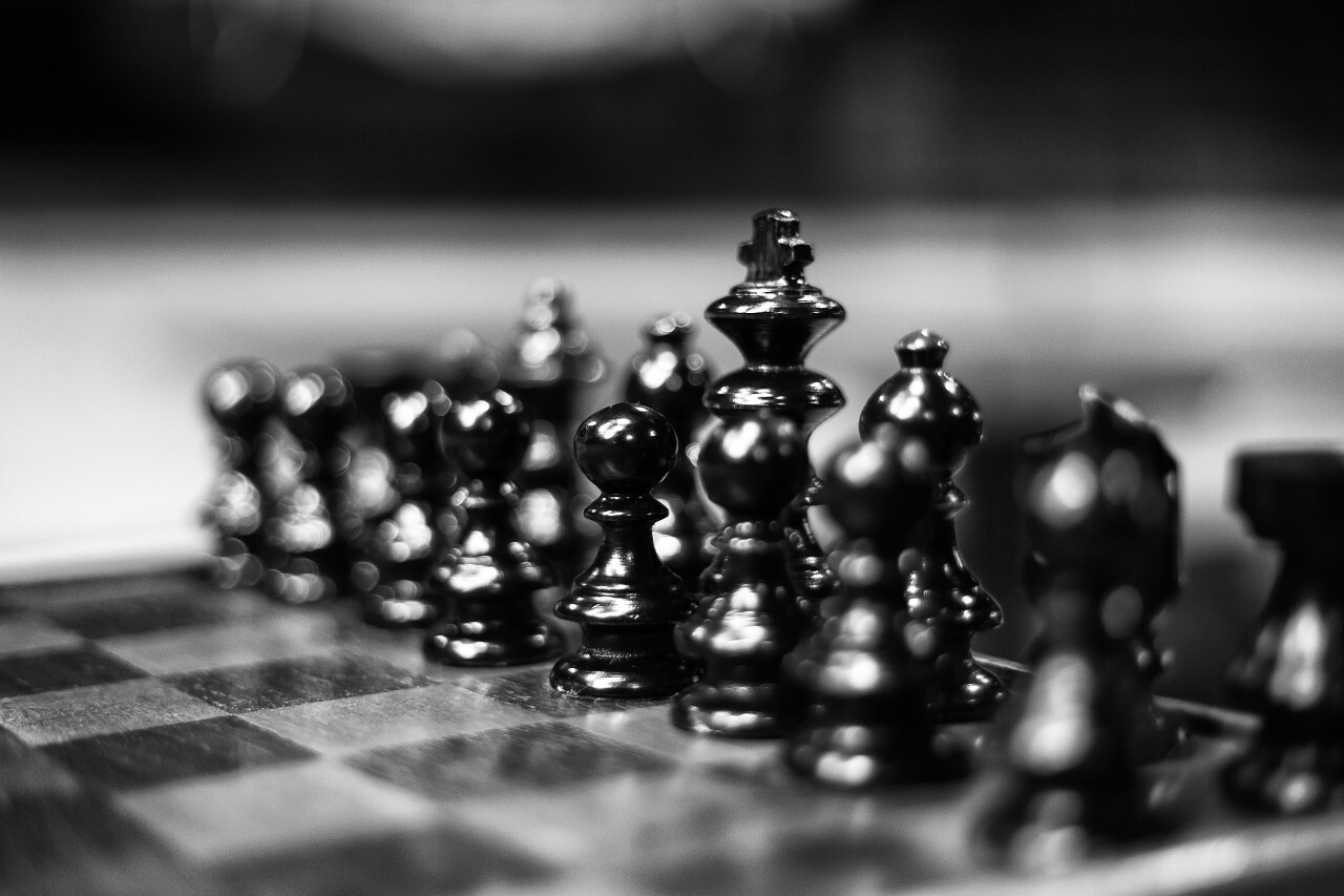 chessboard with black chess figures