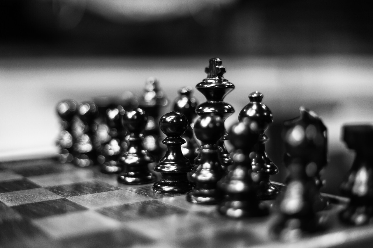 chessboard with black chess figures