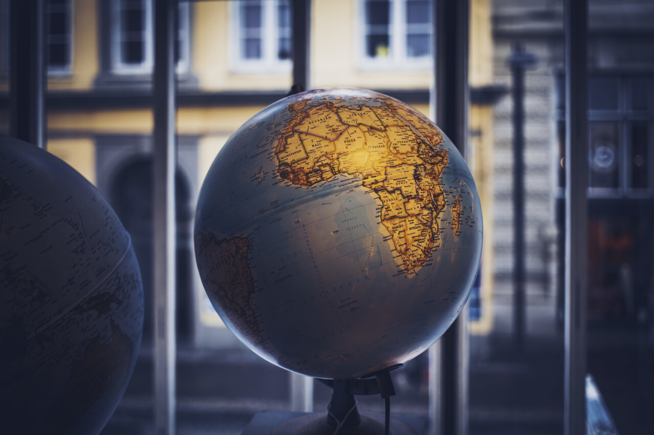 bluish globe on a windowsill