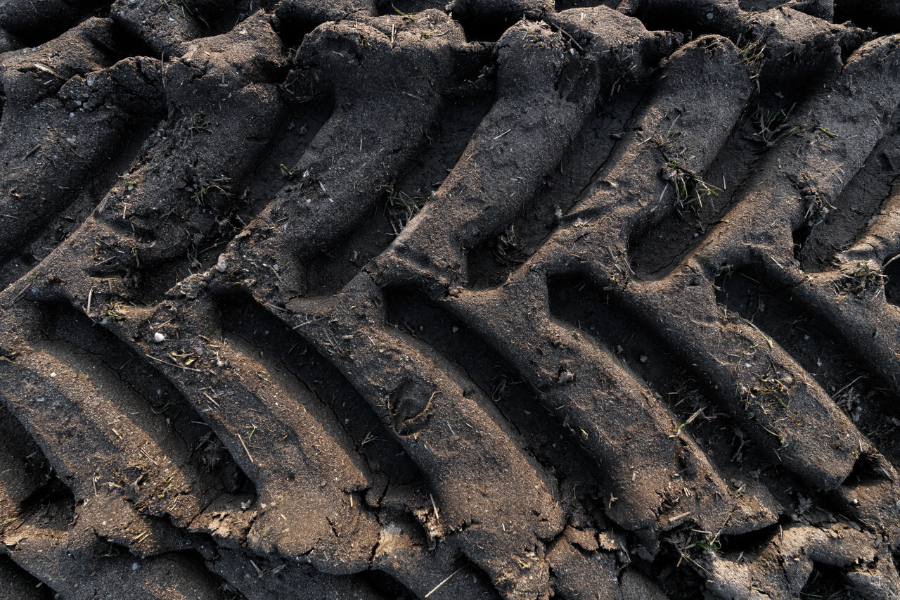 Tractor tracks in the mud texture