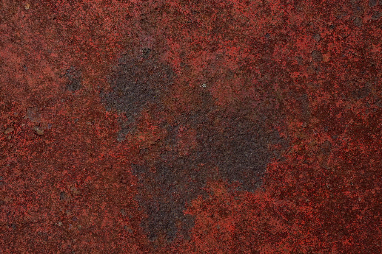 Grunge weathered red metal texture