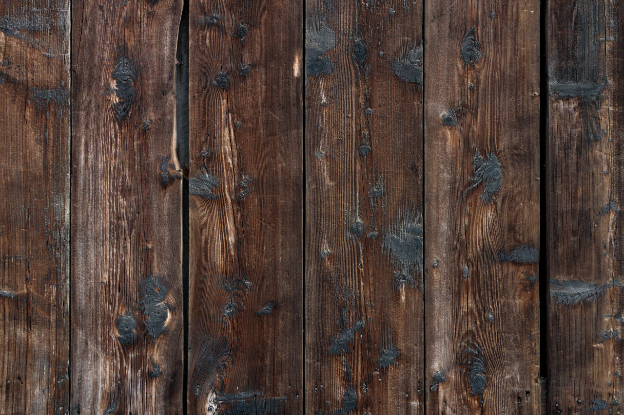 Dark brown natural wood plank background