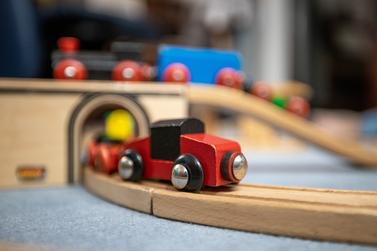 Red wooden train in the nursery