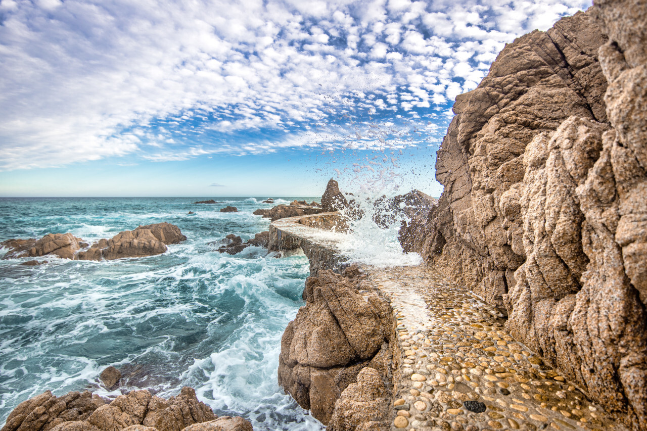 Bridge in the sea at Canyet de Mar Panorama