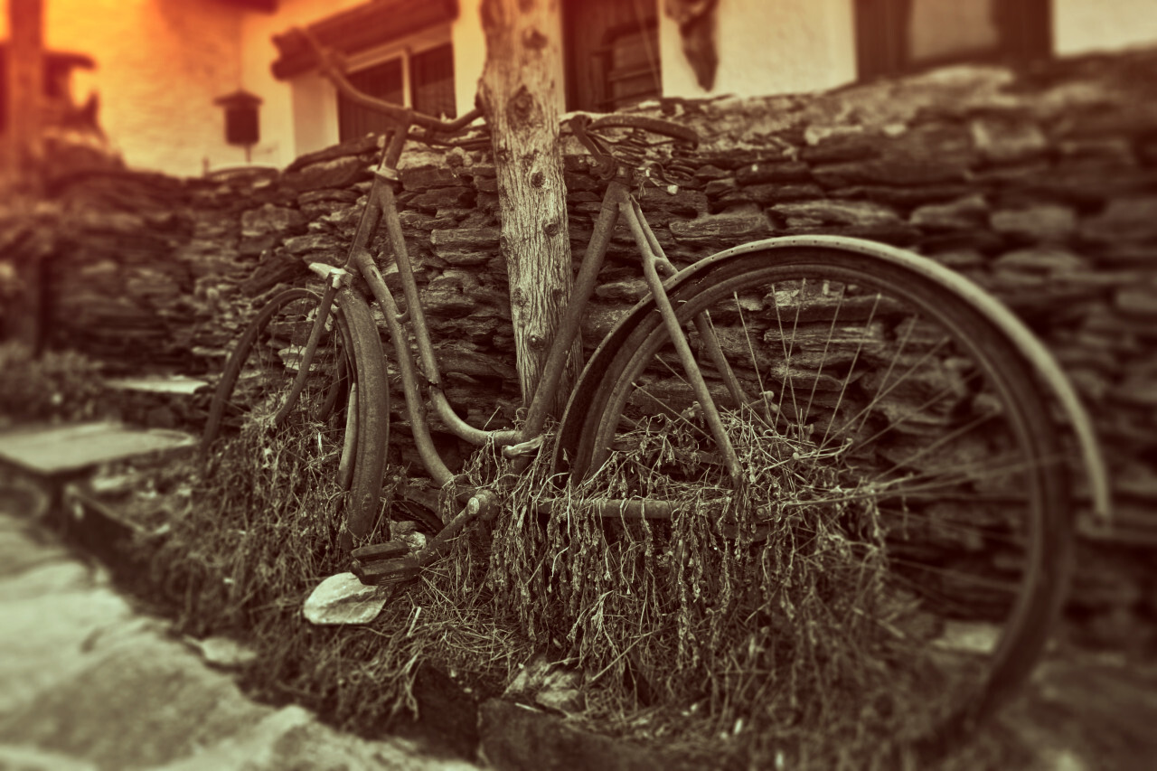 Old bike on the side of the road