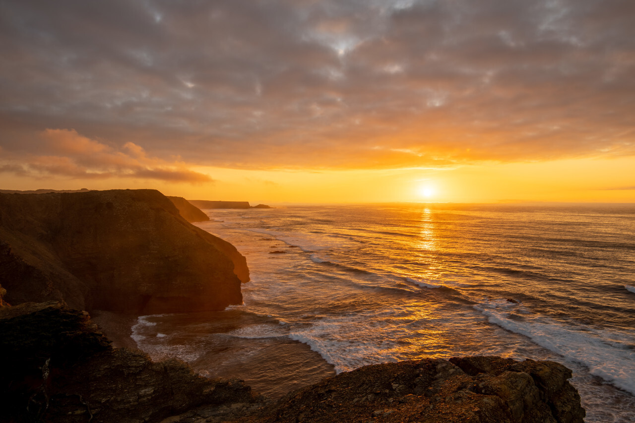 Praia de monte Clerigo Sunset over the Atlantic Ocean Landscape