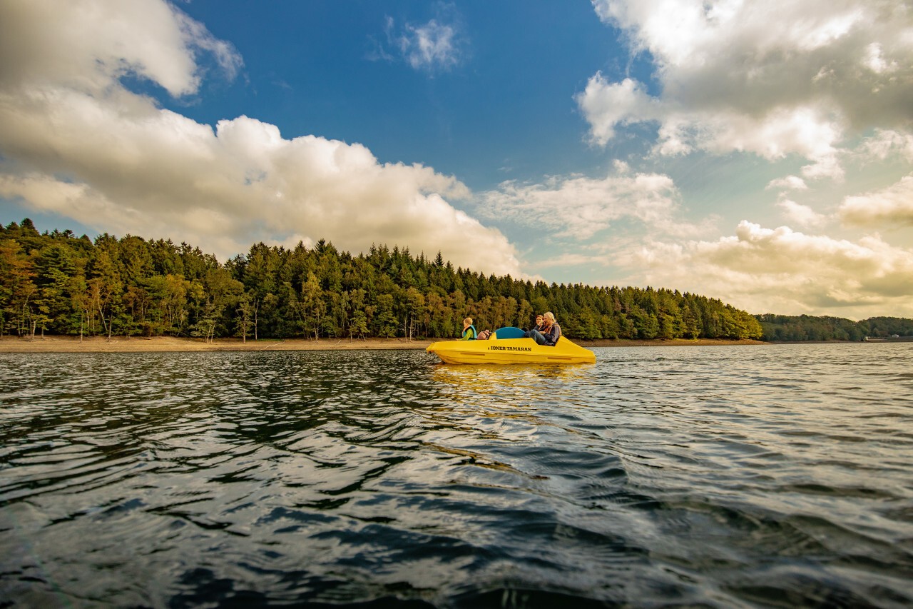 Bevertalsperre yellow boat on a lake