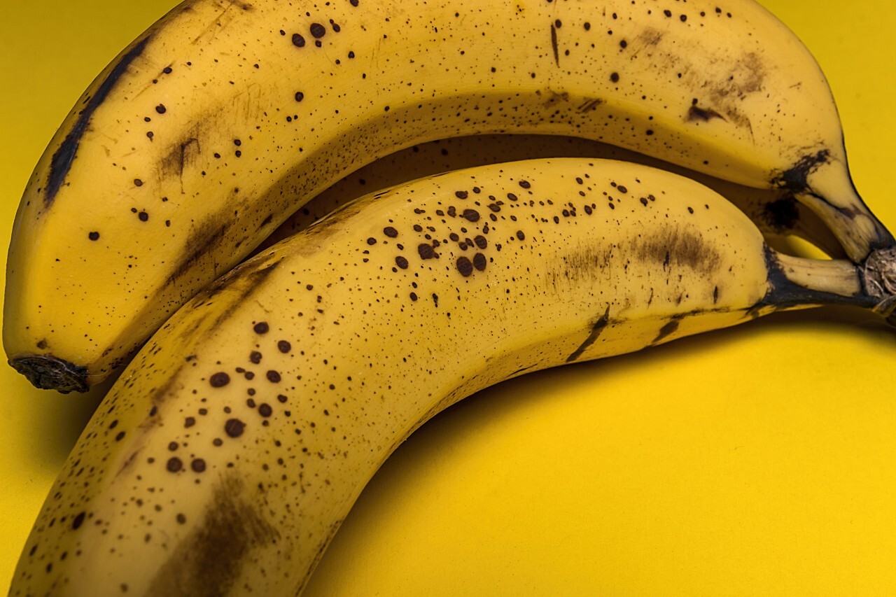 ripe bananas yellow background