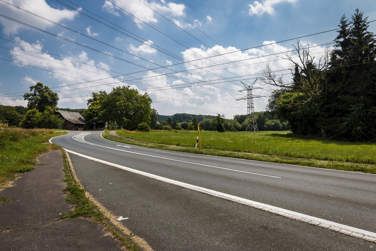 country road through beautiful landscape