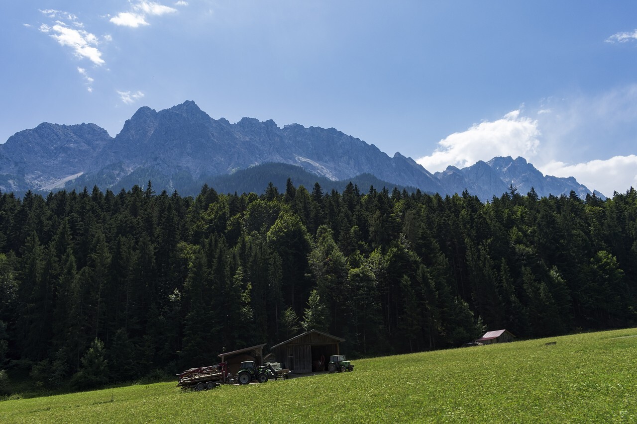 Idyllic mountain landscape in the Alps with traditional mountain lodge