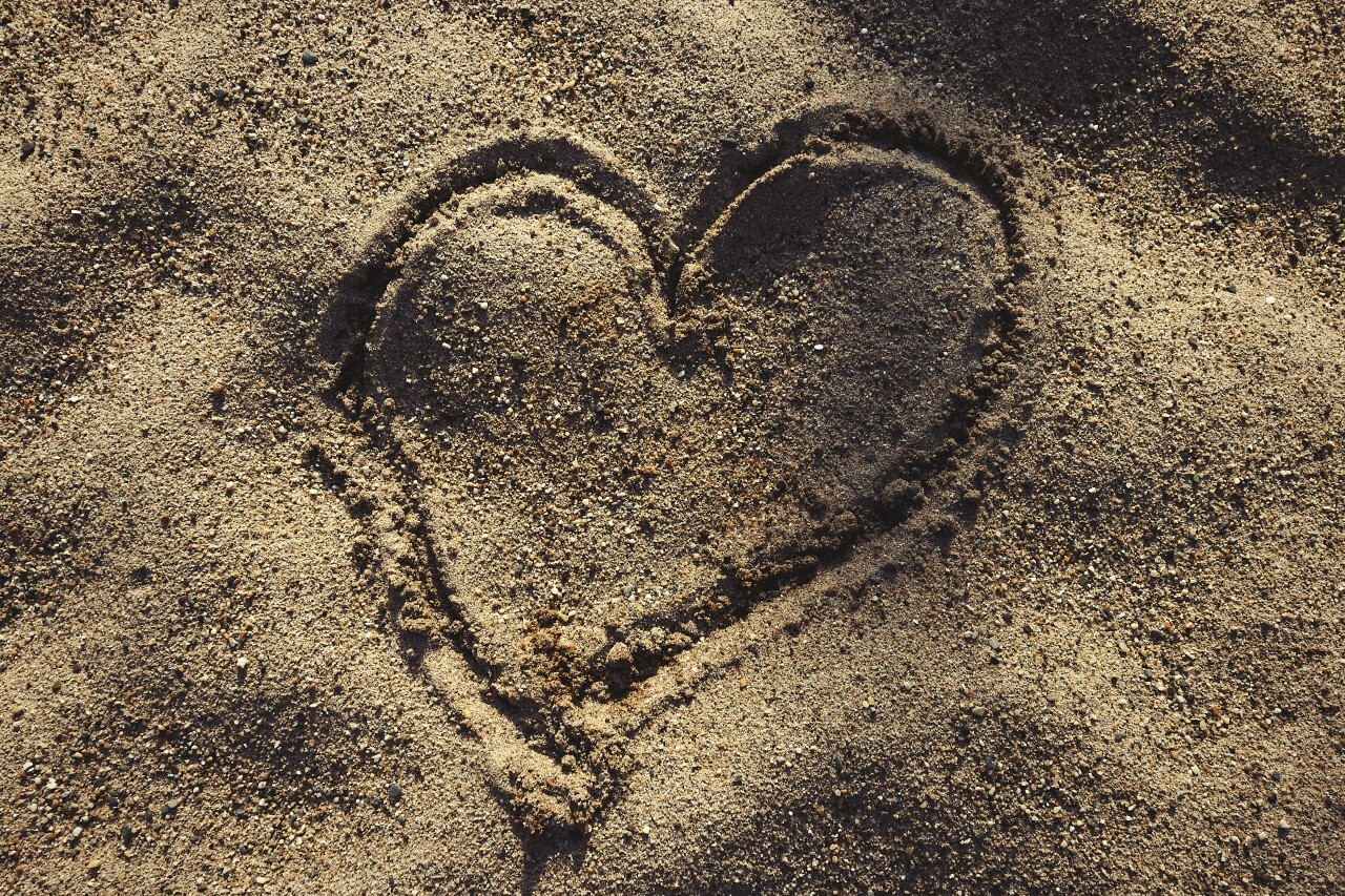 heart drawn in sand